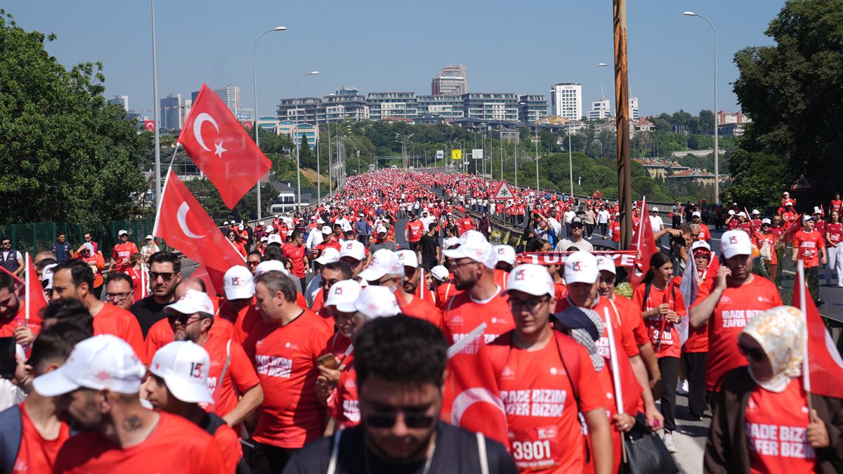 Crowds walk across İstanbul's July 15 Martyrs' Bridge during the 10th-anniversary commemoration